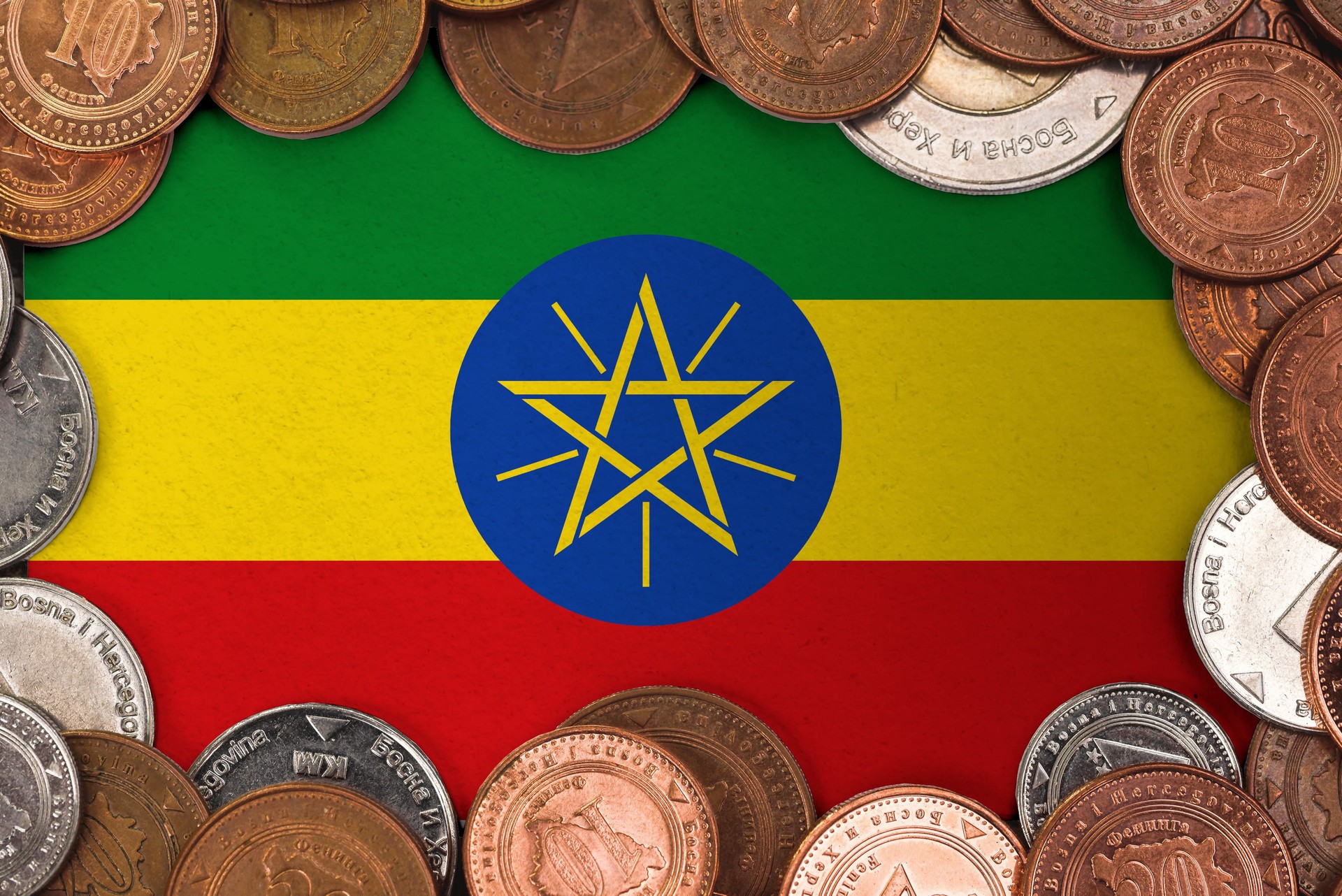 Coins on flag of Ethiopia .